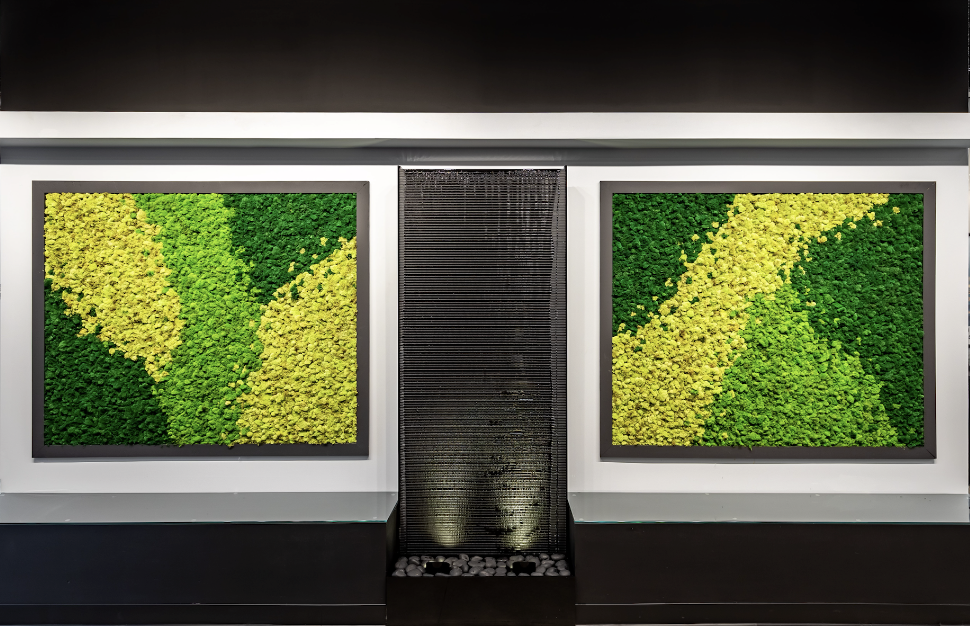 A green and yellow moss wall in a hotel lobby.